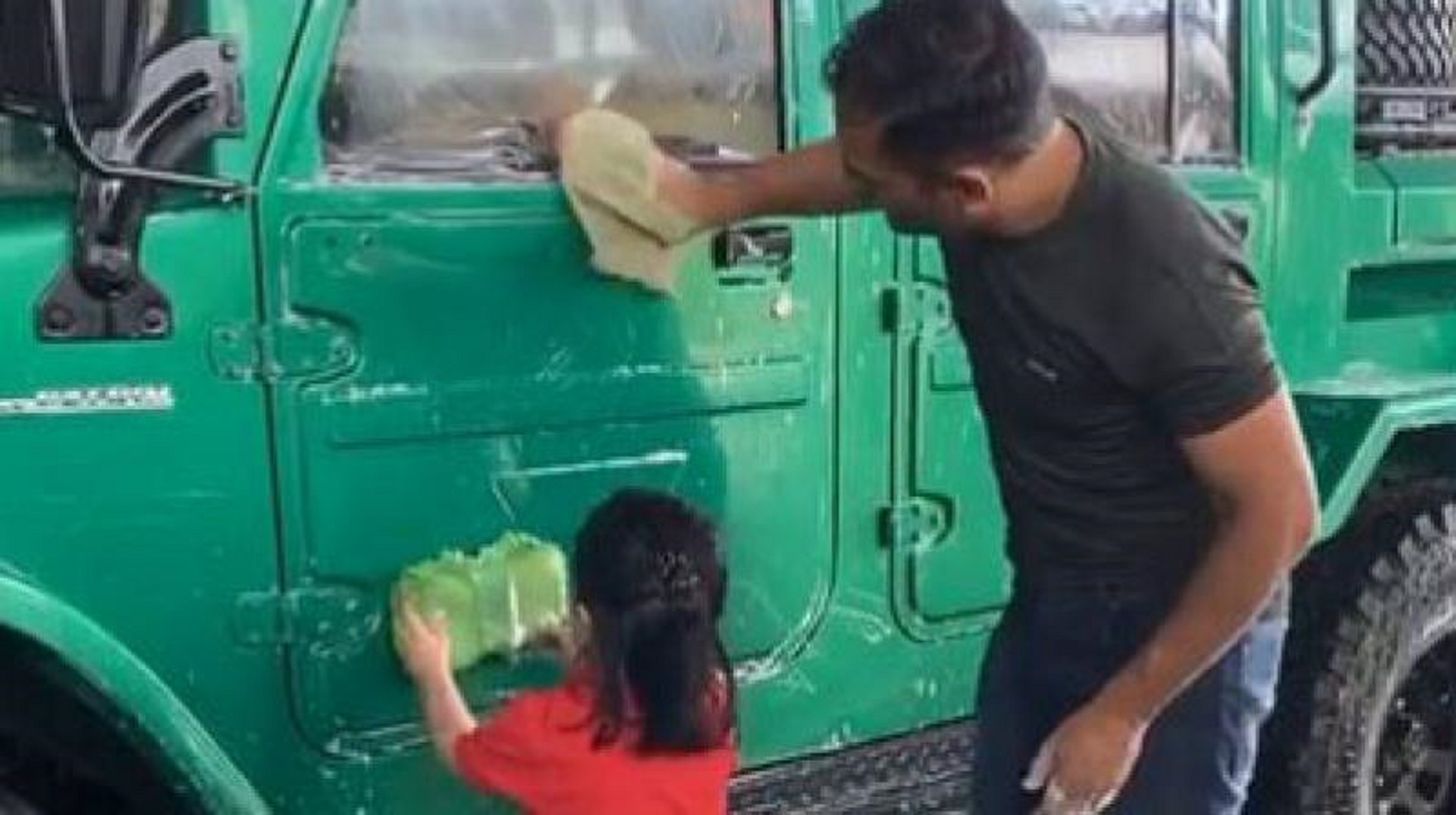 Watch: Ziva Helps Dad MS Dhoni Clean His New “Army Car”, in Viral Video